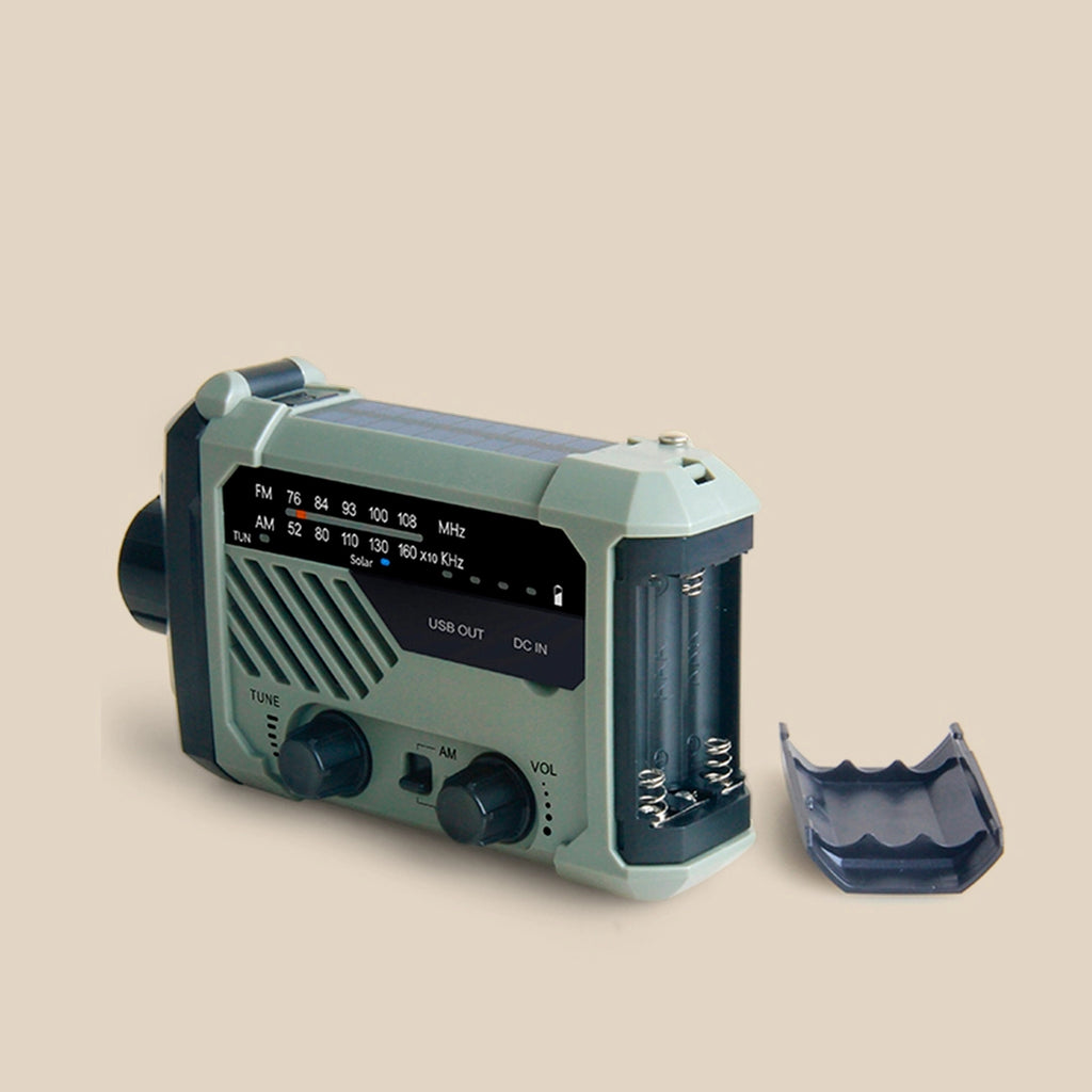 Radio de emergencia alimentada por energía solar y manivela.